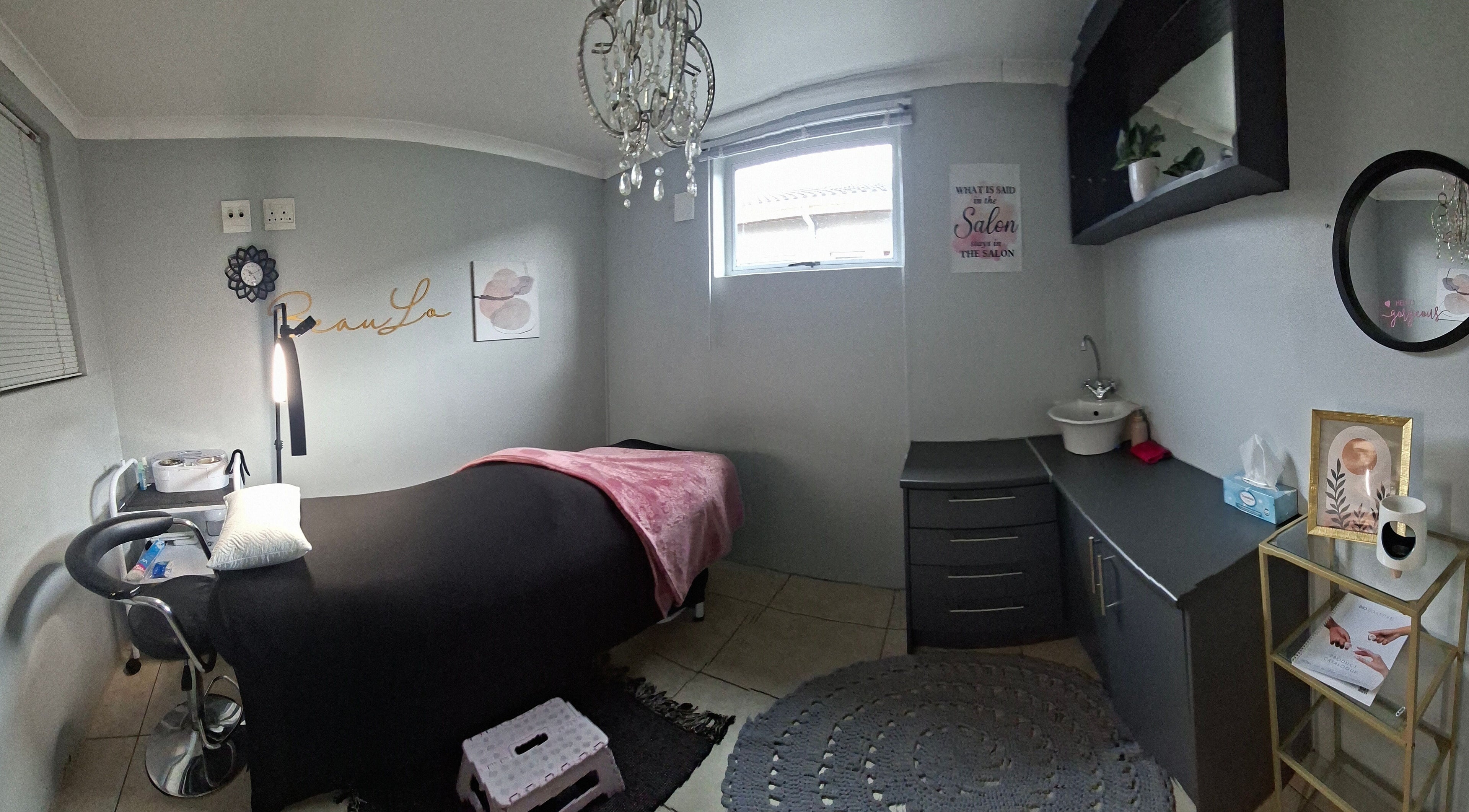 Elegant treatment room at BeauLo in Cape Town, Western Cape, ZA, featuring modern decor and soft lighting.