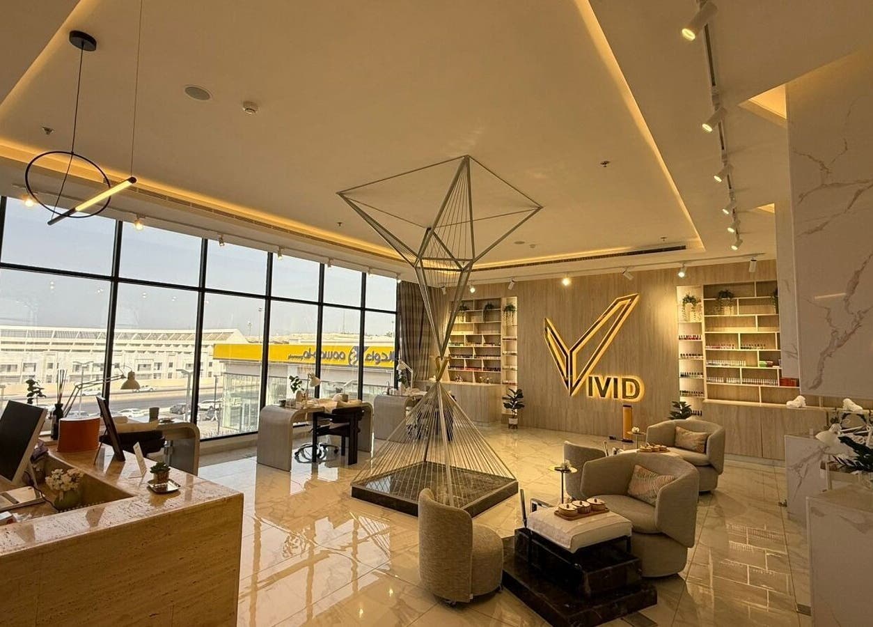 Elegant lobby of Vivid Fitness and Spa in Al Khobar, Eastern Province, SA, featuring modern decor and seating.