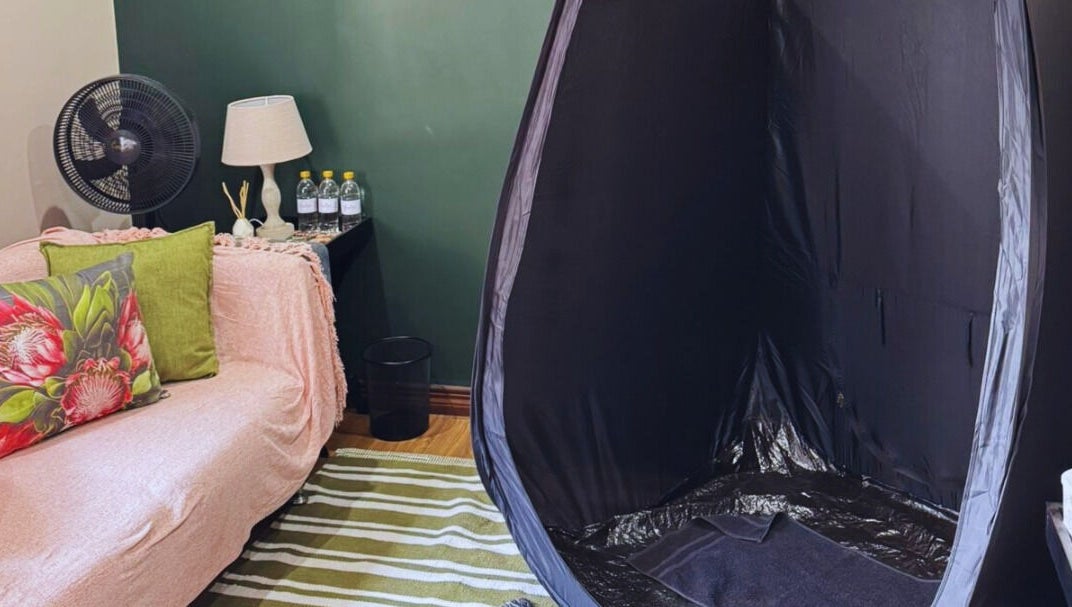 Cozy tanning room at Glow Tan Spray Tan Salon in Olifantsfontein, Gauteng, ZA with stylish decor and spray tan tent.