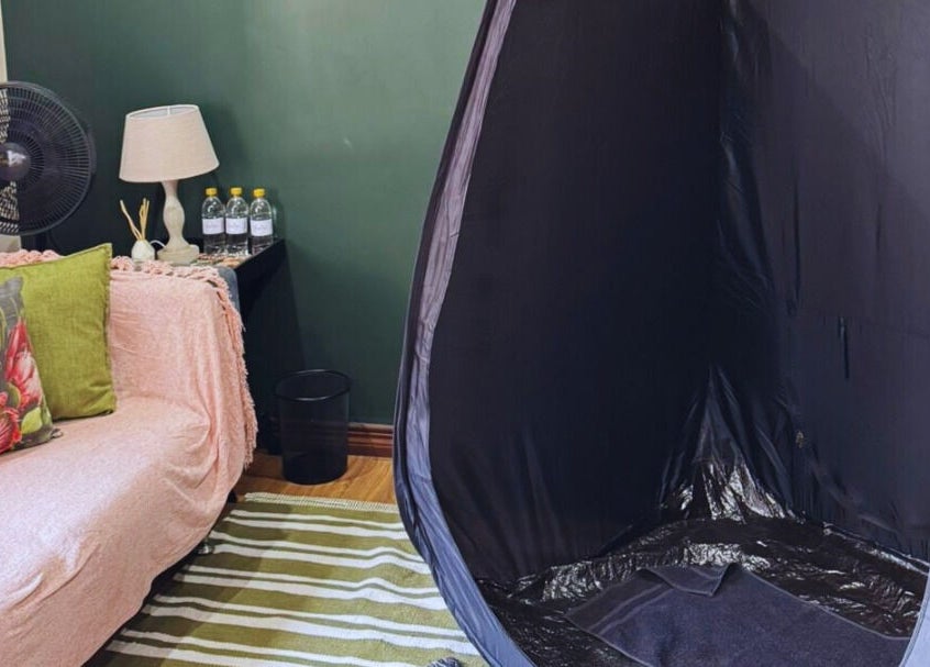 Cozy tanning room at Glow Tan Spray Tan Salon in Olifantsfontein, Gauteng, ZA with stylish decor and spray tan tent.