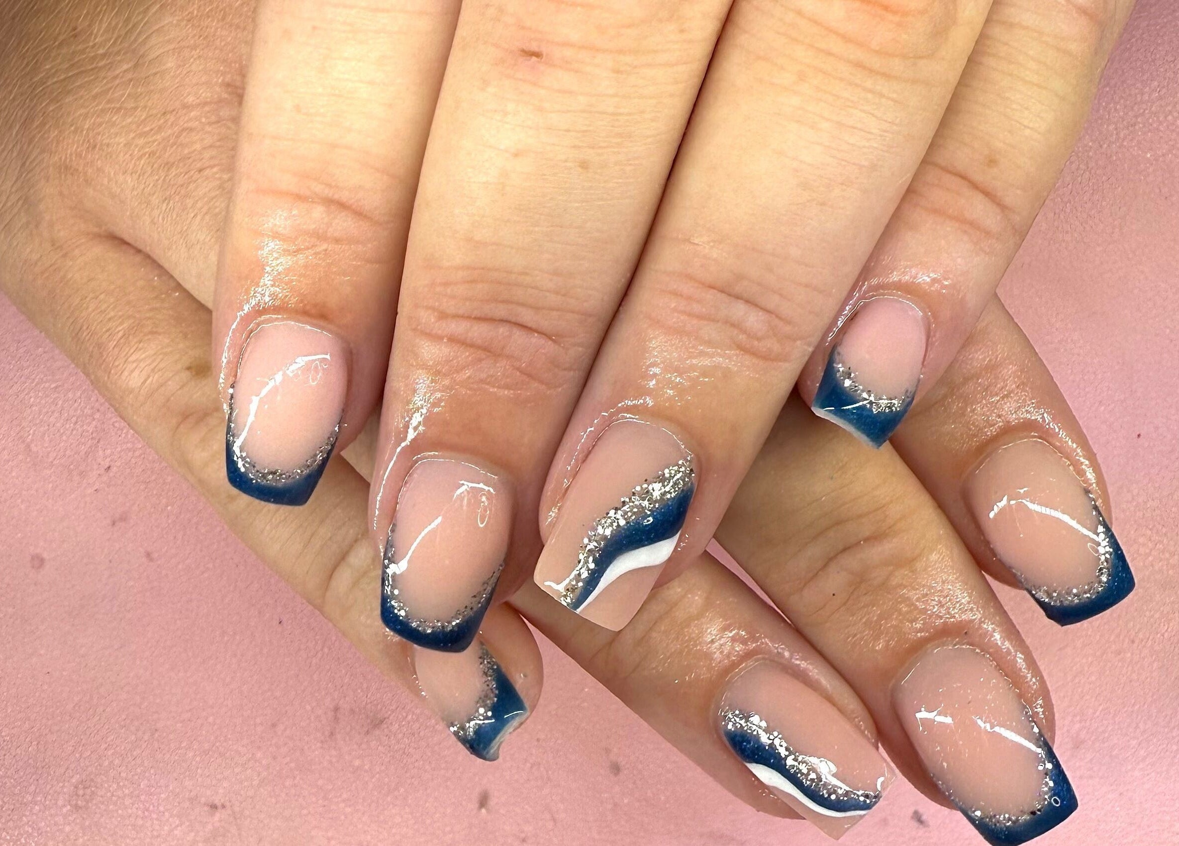 Elegant blue and silver nail design at Shannon lea Beauty and Nails, Ashton-in-makerfield, England, GB.