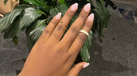 Manicured hand with elegant rings at Nails by Faith, Cape Town, Western Cape, ZA.