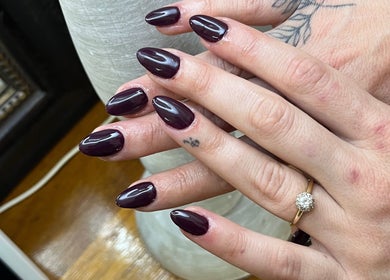 Elegant violet nails styled at Nails by Faith, Cape Town, Western Cape, ZA, showcasing intricate art.