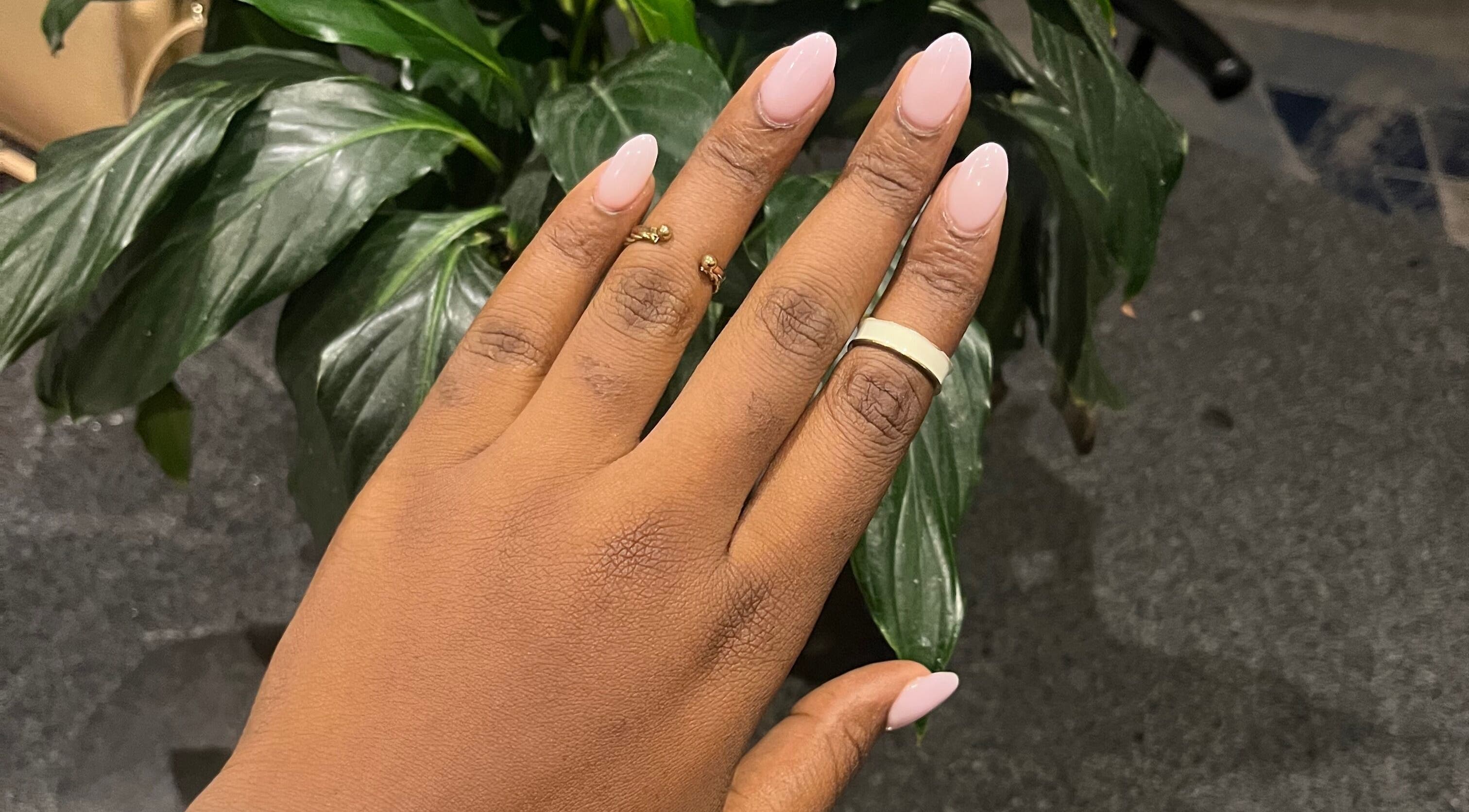 Elegant pink manicure at Nails by Faith, Cape Town, Western Cape, ZA. Showcasing nail artistry.