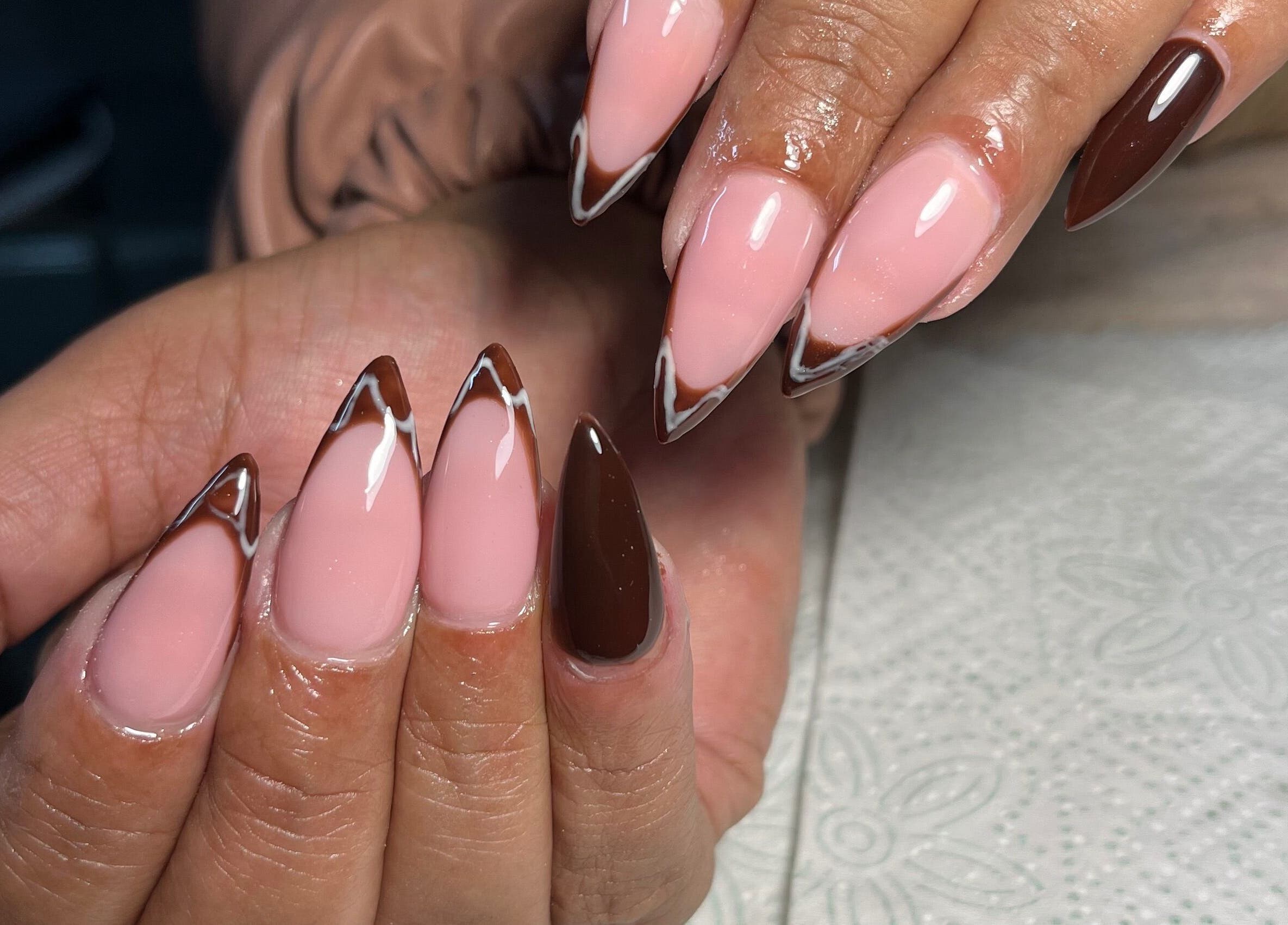 Stylish almond-shaped nails with a brown and pink gradient at Nails by Faith, Cape Town, Western Cape, ZA.