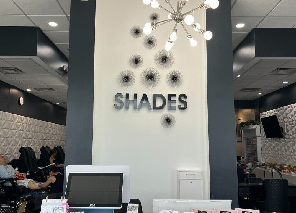 Interior of Shades Nail Bar in Worthington, Ohio, US showcasing chic decor and serene atmosphere.