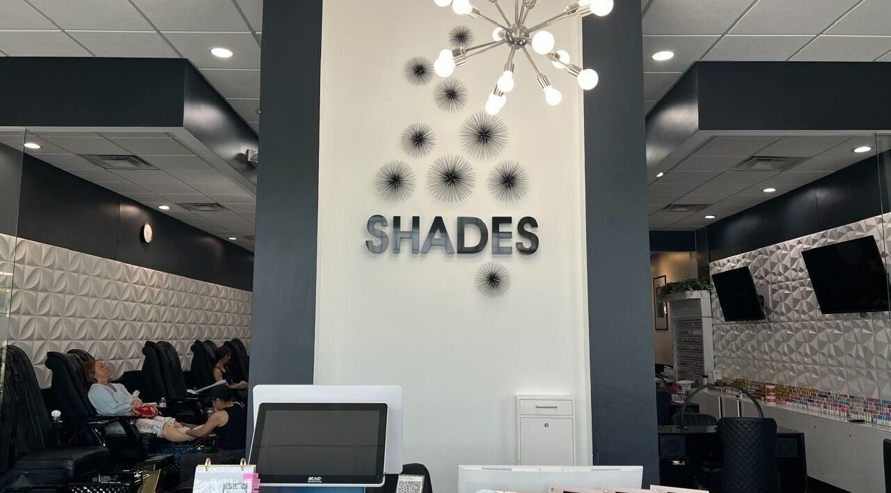 Interior of Shades Nail Bar in Worthington, Ohio, US showcasing chic decor and serene atmosphere.