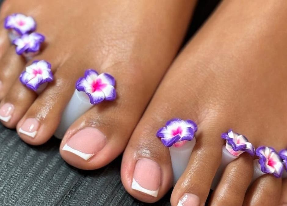 Elegant floral pedicure at Luxe Nails Lounge in Southend-on-sea, England, GB showcasing pristine nail art.