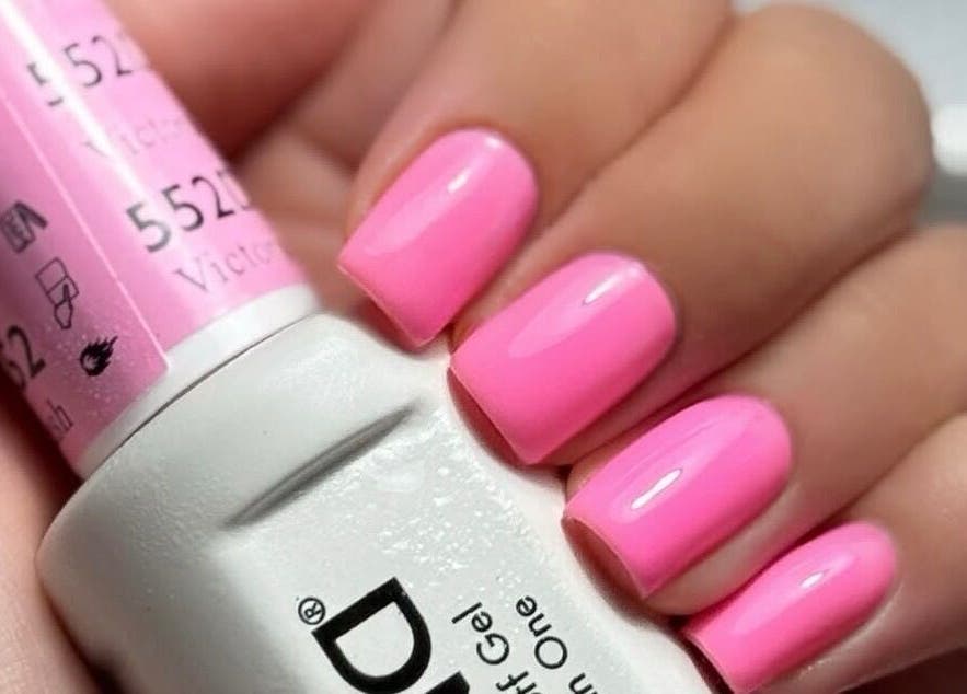 Stylish pink nails at Luxe Nails Lounge in Southend-on-sea, England, GB enhance a chic manicure look.
