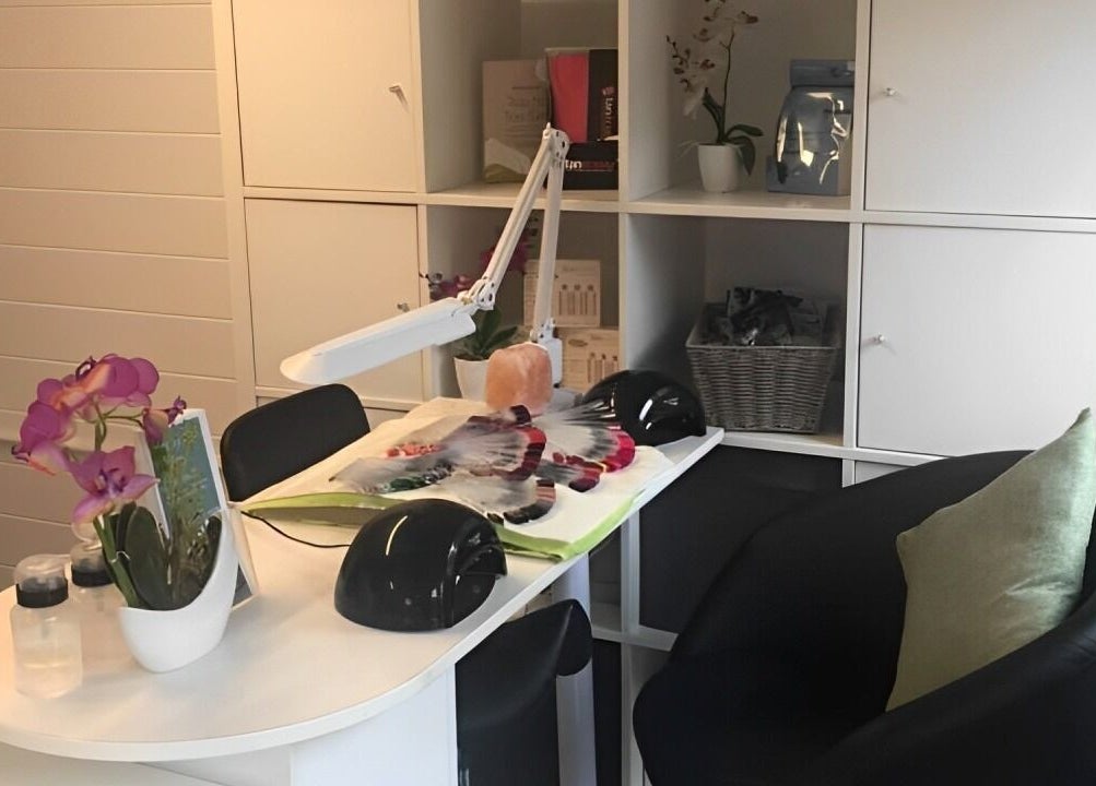Modern nail station at Beauty by Amy Bennett, Blackburn, Scotland, GB, featuring elegant decor and tools.