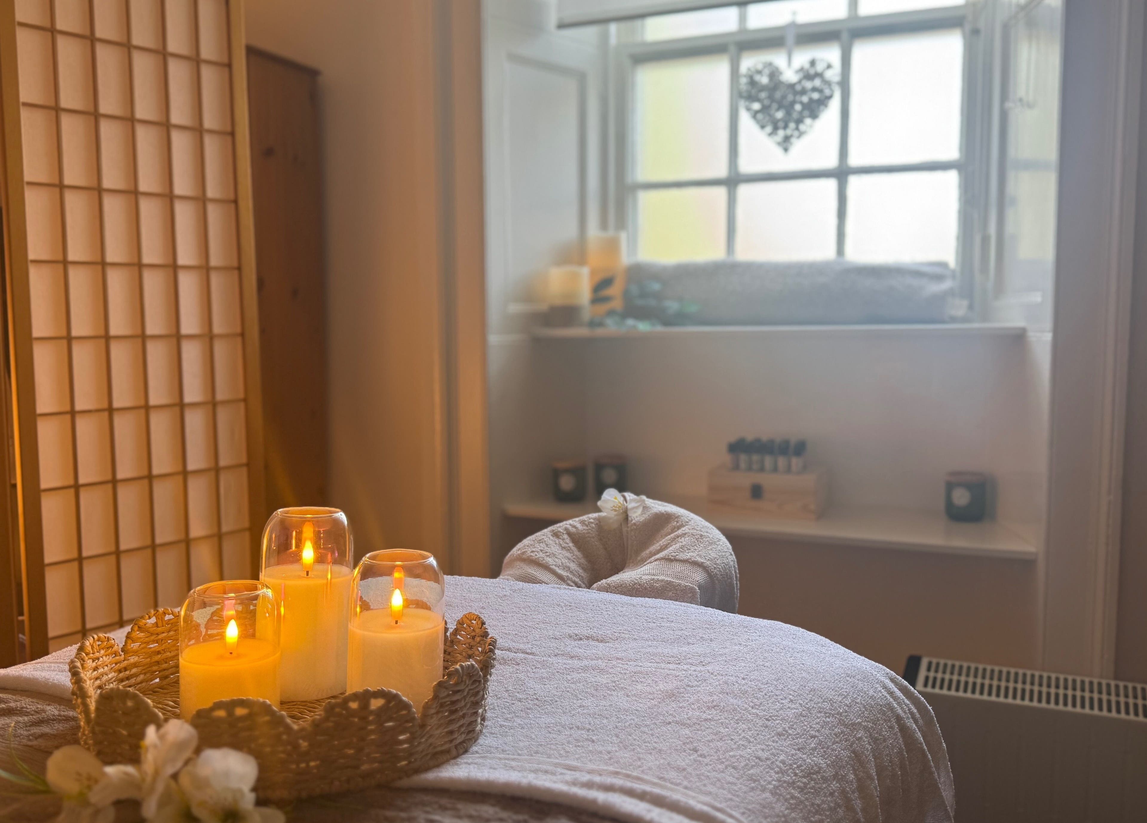 Candlelit massage room at Dream Complementary Therapy, Elgin, Scotland, GB, creating a calming ambiance.
