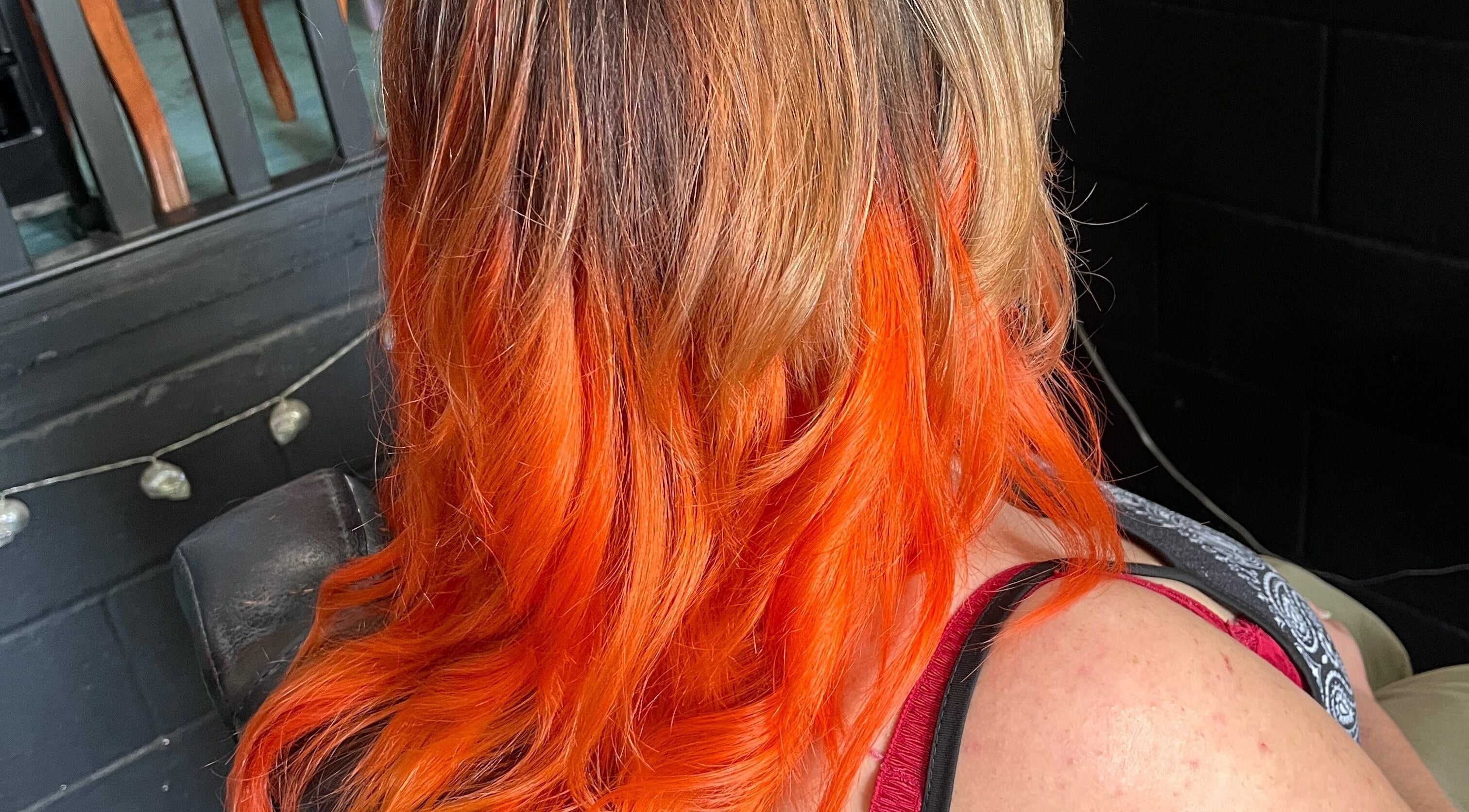 Vibrant orange hairstyle transformation at Hannah Grace Hair @ The Wolf Pack, Norwich, England, GB.