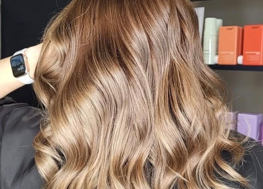 Elegant wavy blonde hairstyle at The Blonde Theory in Penrith, England, GB showcasing stunning hair products.