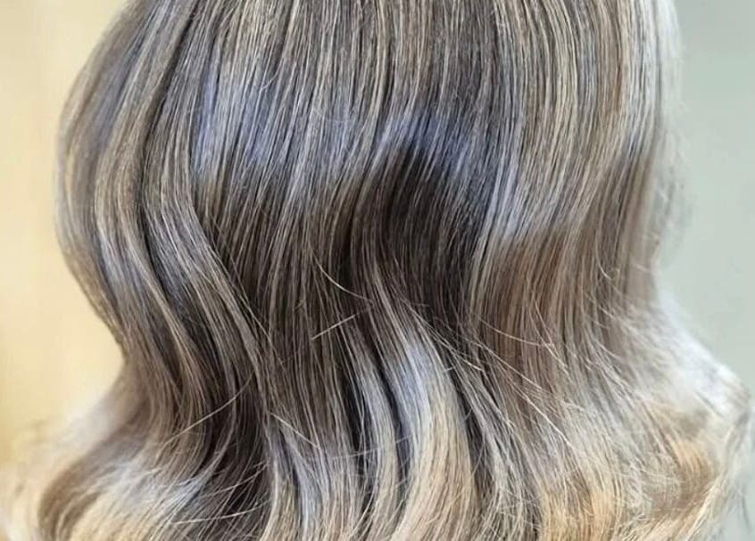 Elegant wavy blonde hair styled at The Blonde Theory in Penrith, England, GB.