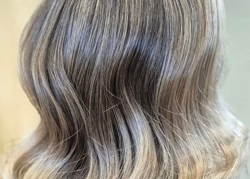 Elegant wavy blonde hair styled at The Blonde Theory in Penrith, England, GB.