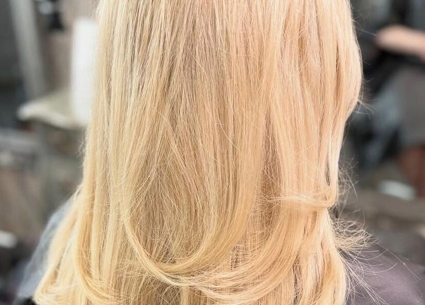 Blonde hair styled elegantly at The Blonde Theory, Penrith, England, GB, showcasing fresh salon results.