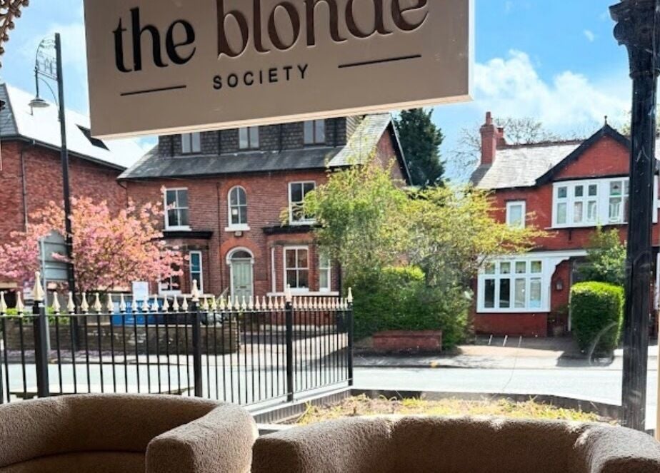View from Paul at The Blonde Society in Bramhall, England, GB. Inviting interior with charming street view.