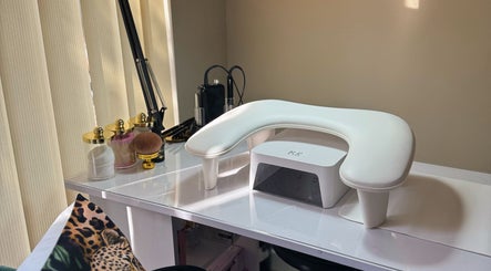 Sleek nail station at Eleventh Beauty, Malvern, England, GB, with manicure tools and elegant decor.