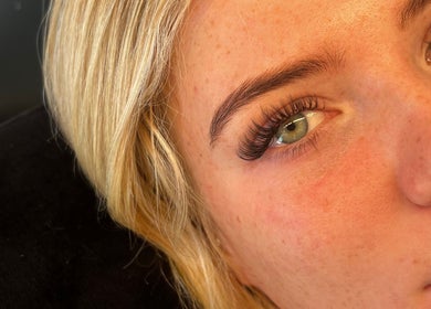 Close-up of eye with lush lashes at The GirlsClub Lashes, Ringwood, England, GB.