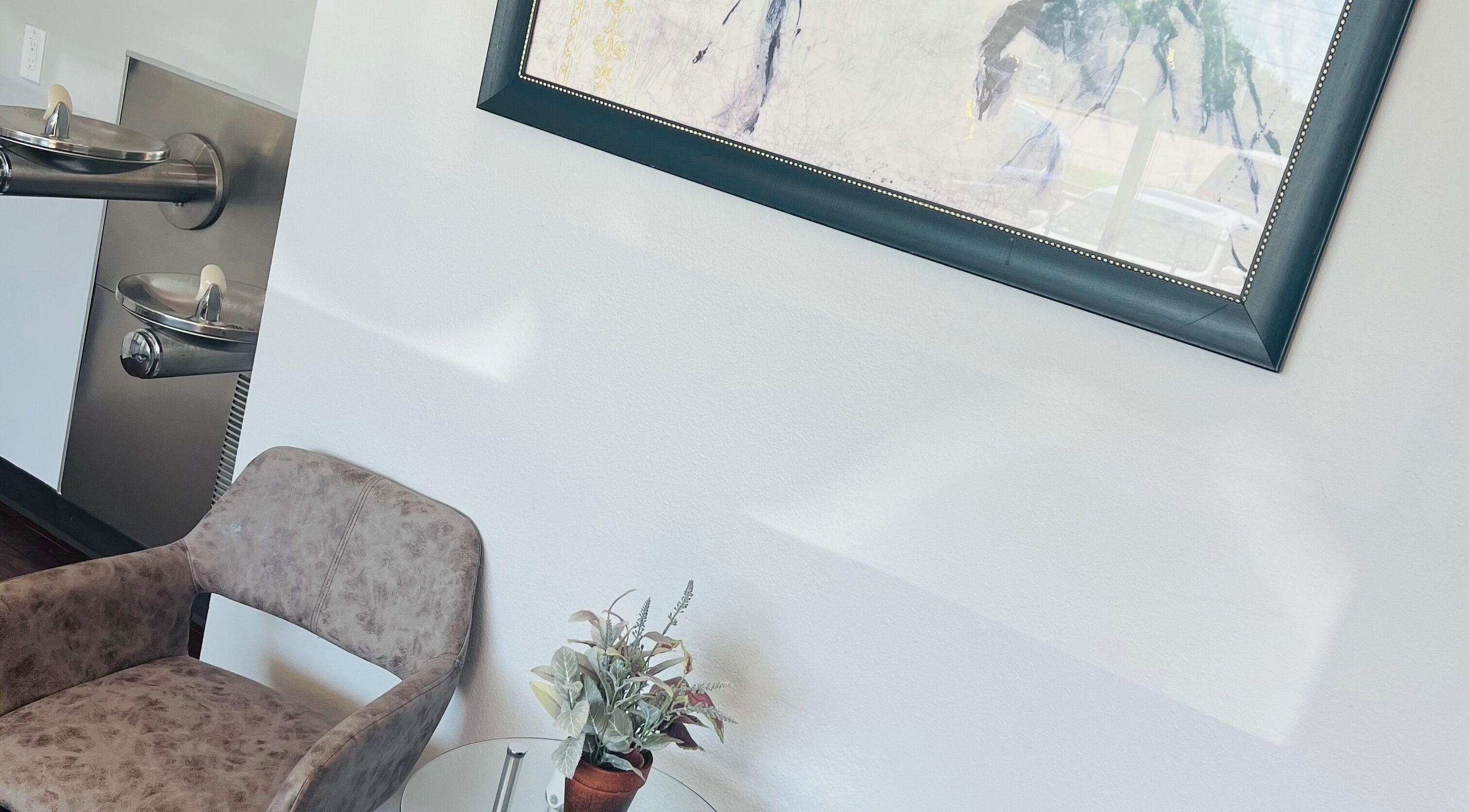 Relaxing seating area at Key Hair Hands, Plano, Texas, US with modern decor and soothing ambiance.