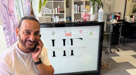 Person smiling at Hair Fashion 3000's inviting reception in Ajax, Ontario, CA, surrounded by beauty products.