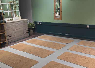 Ene Holistics yoga studio with mats and cozy decor in Warrington, England, GB.