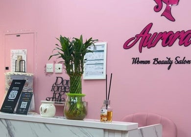 Reception area at Aurora Beauty Women Salon in Dubai, AE, featuring elegant decor and welcoming ambiance.