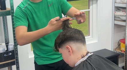 Haircut in progress at clell_cutz, Crossgates, Scotland, GB, showcasing precision cutting technique.