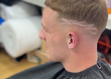 Fresh faded haircut at clell_cutz in Crossgates, Scotland, GB showcasing expert styling.