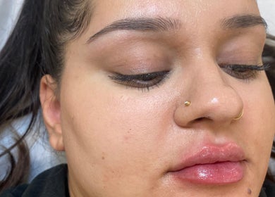 Relaxed client with glowing skin at Get The Glo Wellness & Beauty in Dorridge, England, GB.