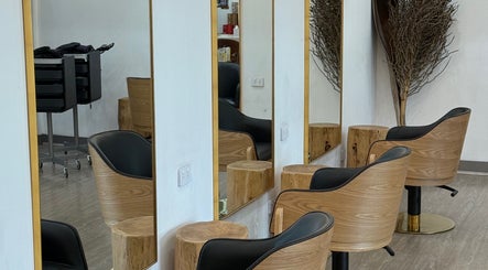Elegant salon chairs against mirrors at Linea Of The Yarra Valley, Lilydale, Victoria, AU.