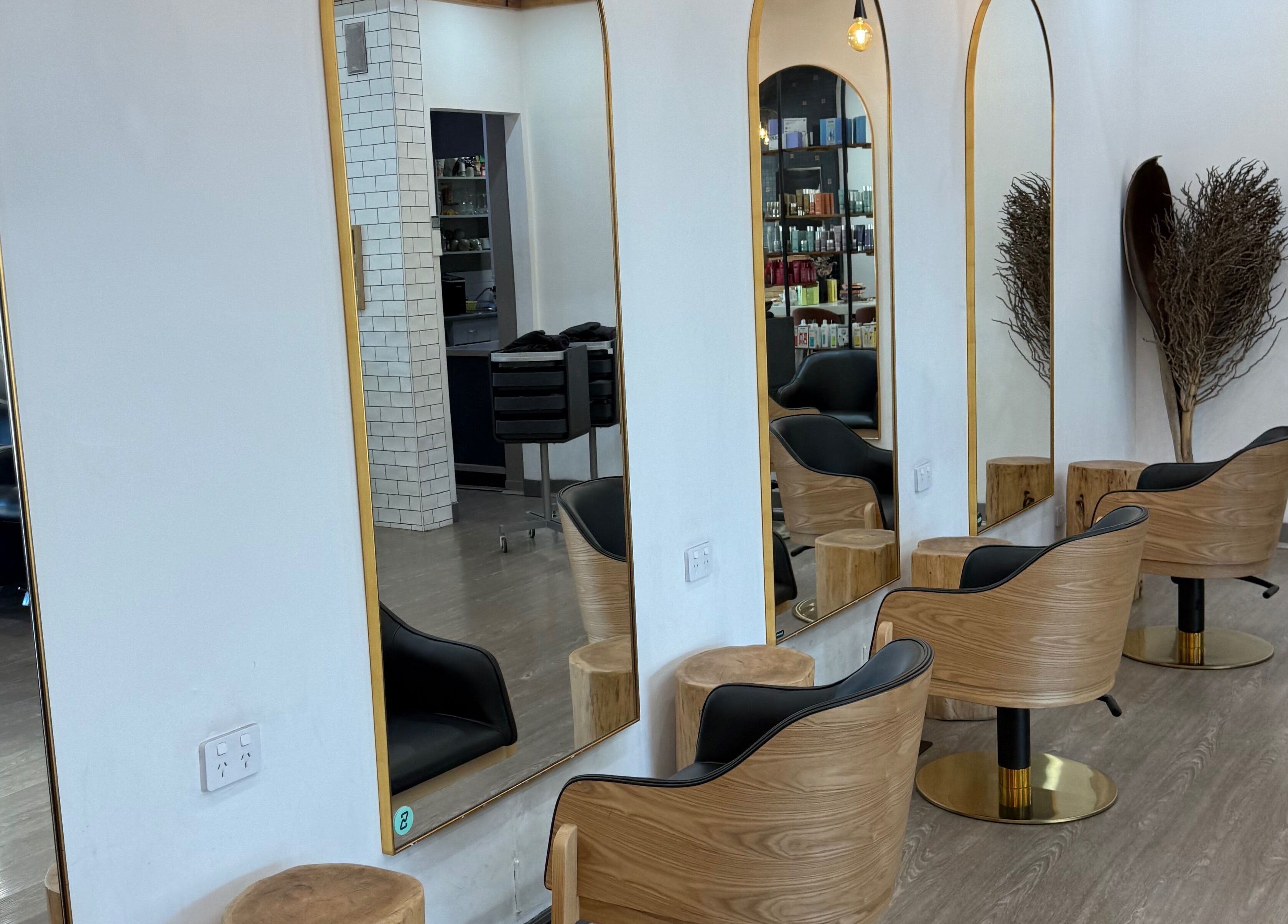 Elegant salon chairs and mirrors at Linea Of The Yarra Valley, Lilydale, Victoria, AU, perfect for beauty services.
