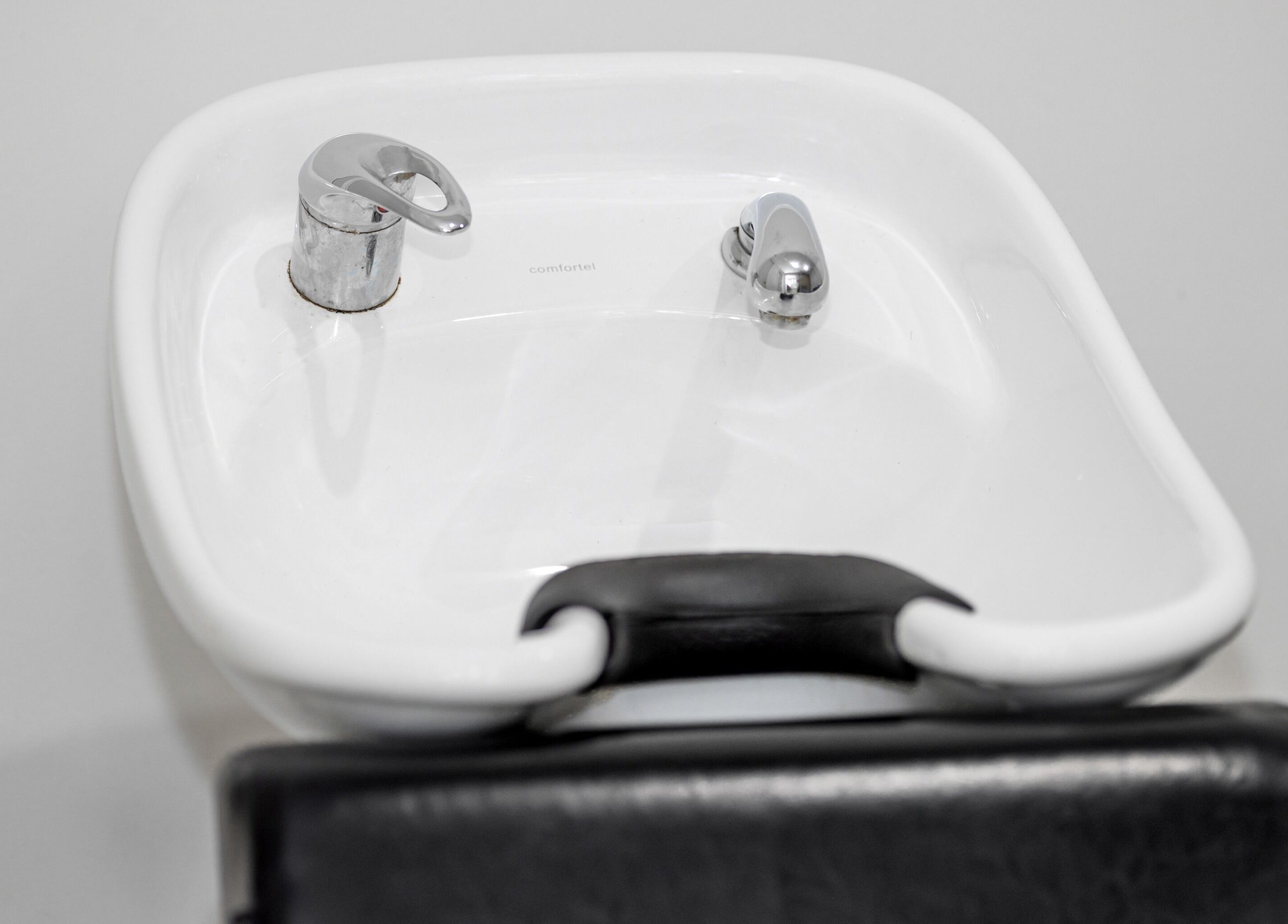 Modern wash basin at Zac Grooming for Men in Glenelg South, South Australia, AU offering superior styling services.