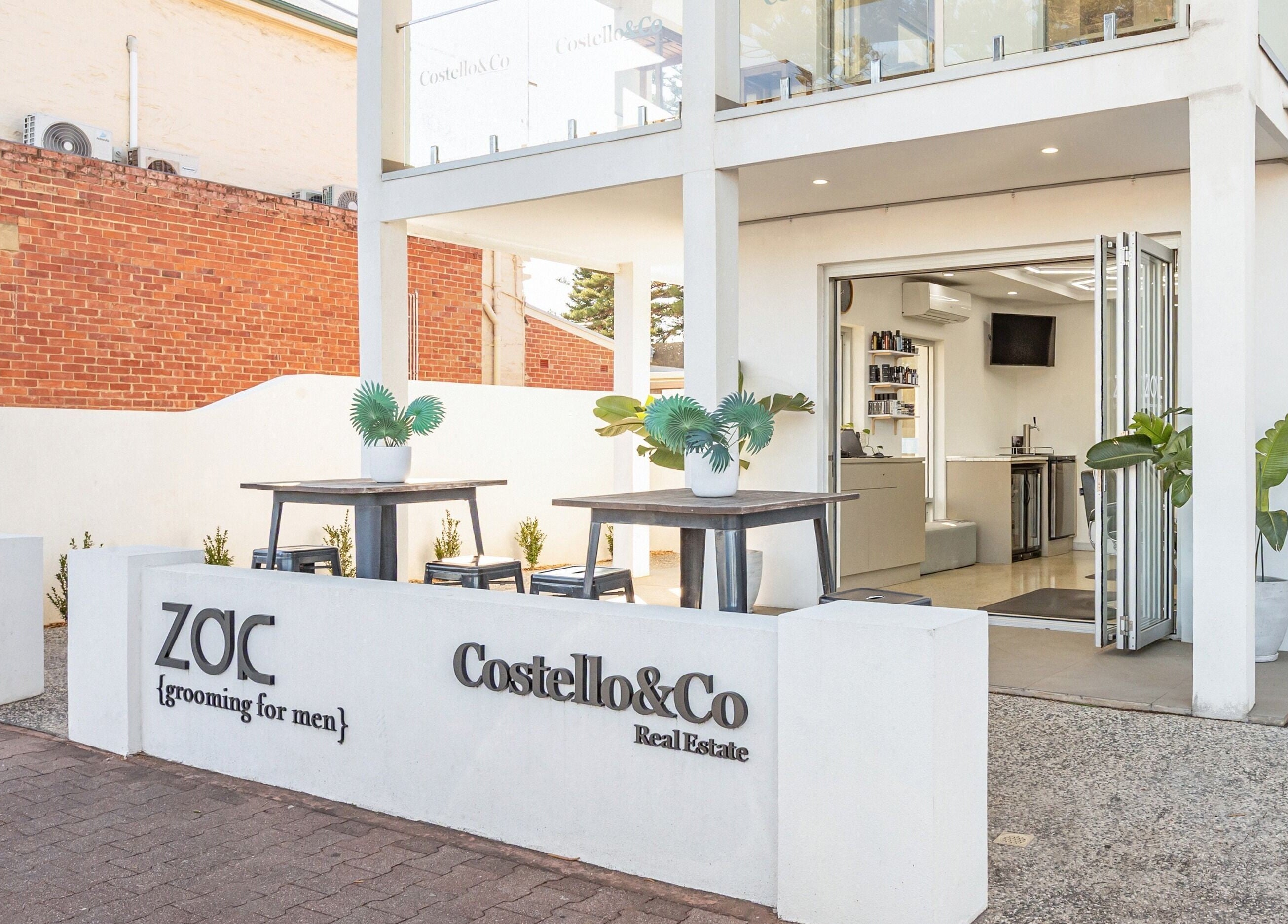 Entrance of Zac Grooming for Men in Glenelg South, South Australia, AU, showcasing a modern, stylish setting.