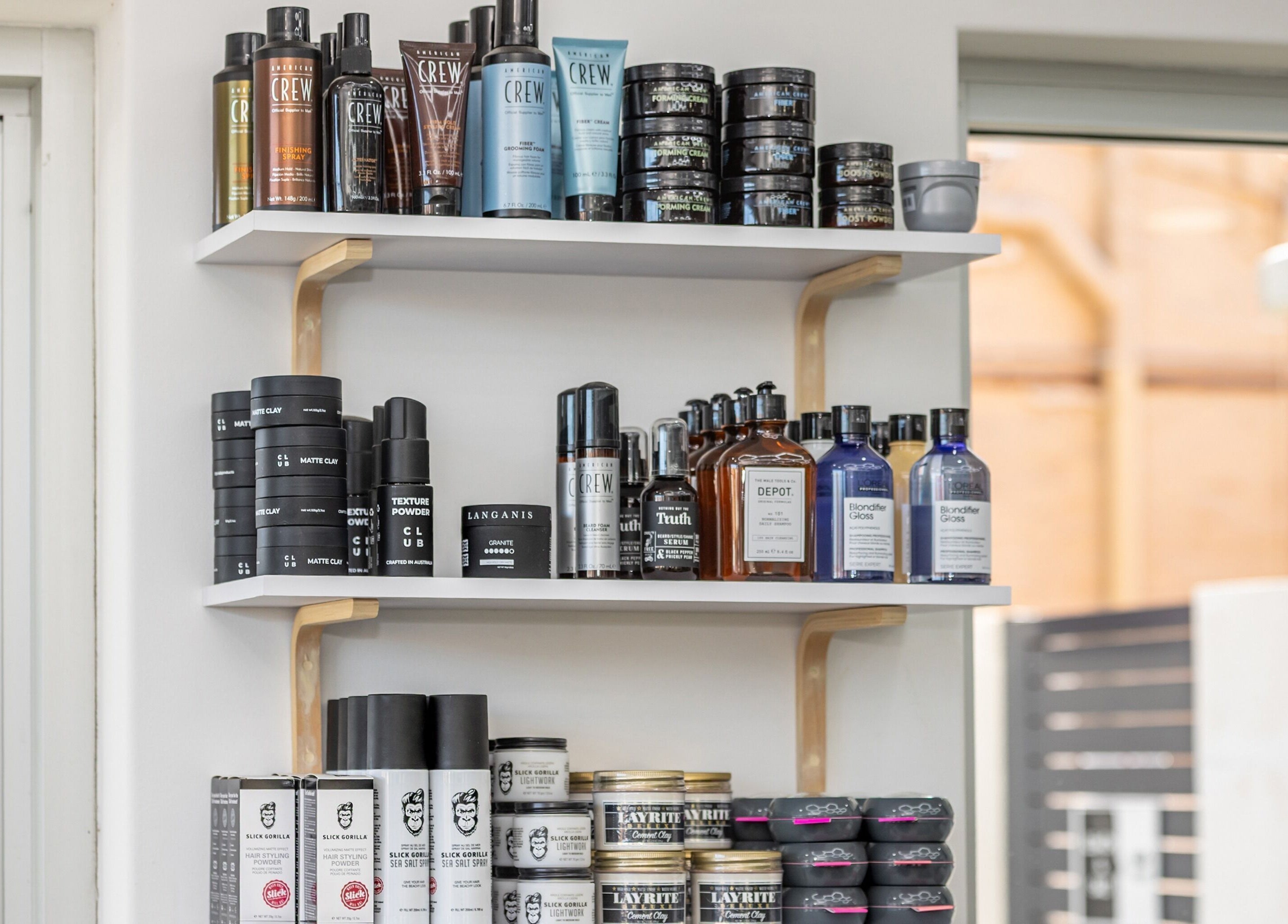 Shelves of premium grooming products at Zac Grooming for Men in Glenelg South, South Australia, AU.