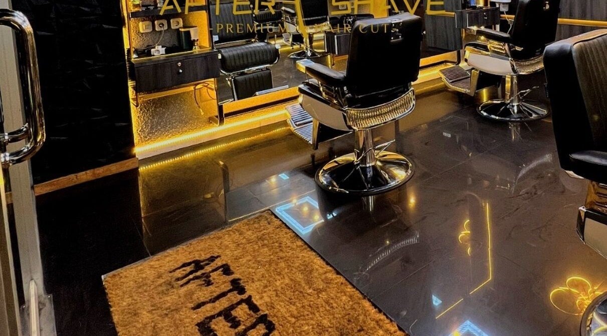 Interior of AFTERSHAVE BARBERSHOP in Bali, Bali, ID featuring sleek barber chairs and modern décor.