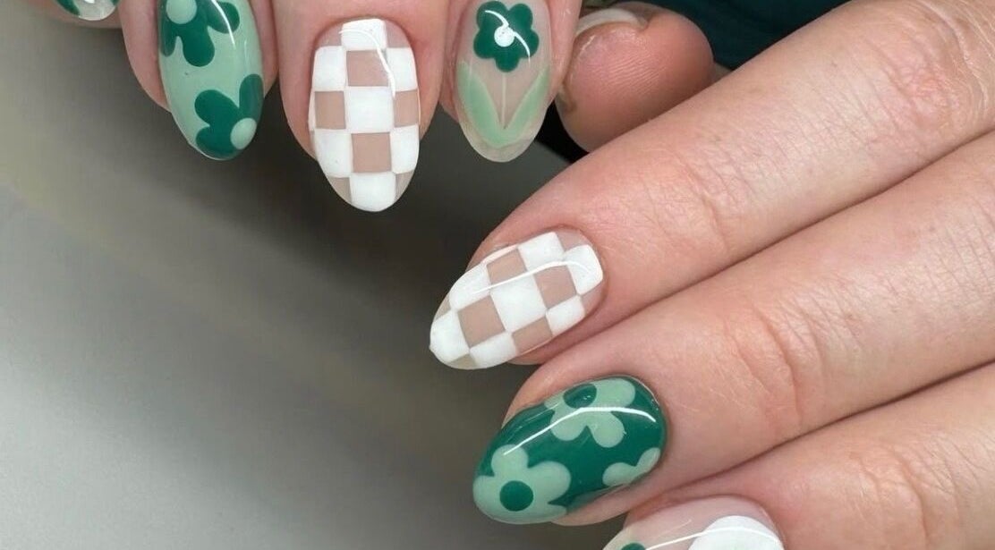 Unique green floral and checkerboard nail art at La Belle Époque, Howick, Kwazulu-natal, ZA.