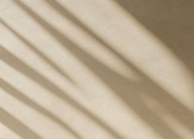 Elegant shadow patterns on a wall at Ziba Beauty.Spa, Las Vegas, Nevada, US, creating a calming ambiance.