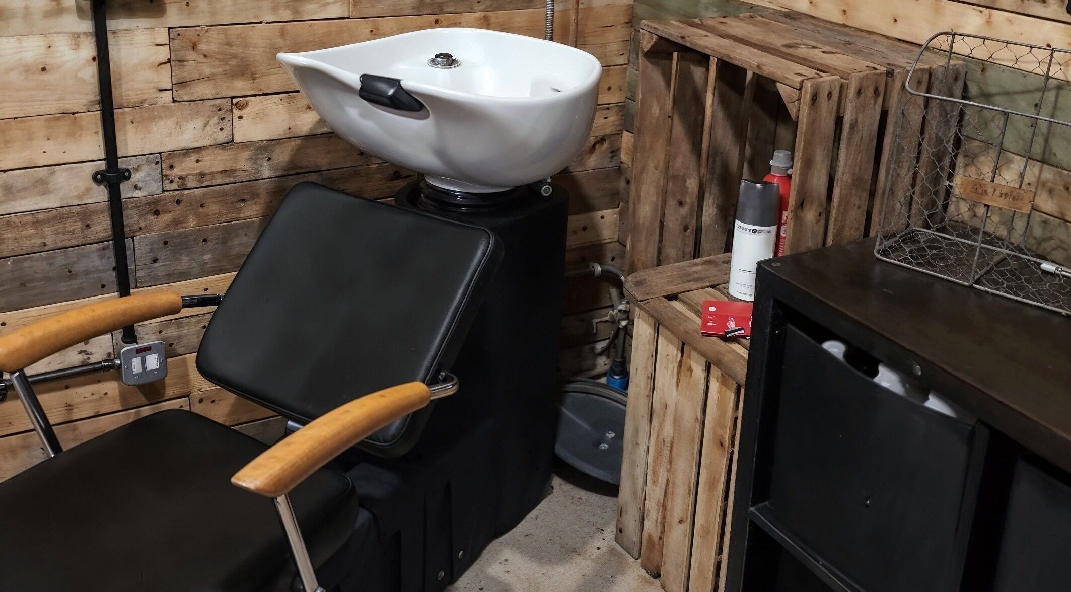 Stylish wash station at The Cabin in Codicote, England, GB with wooden accents and modern sink.