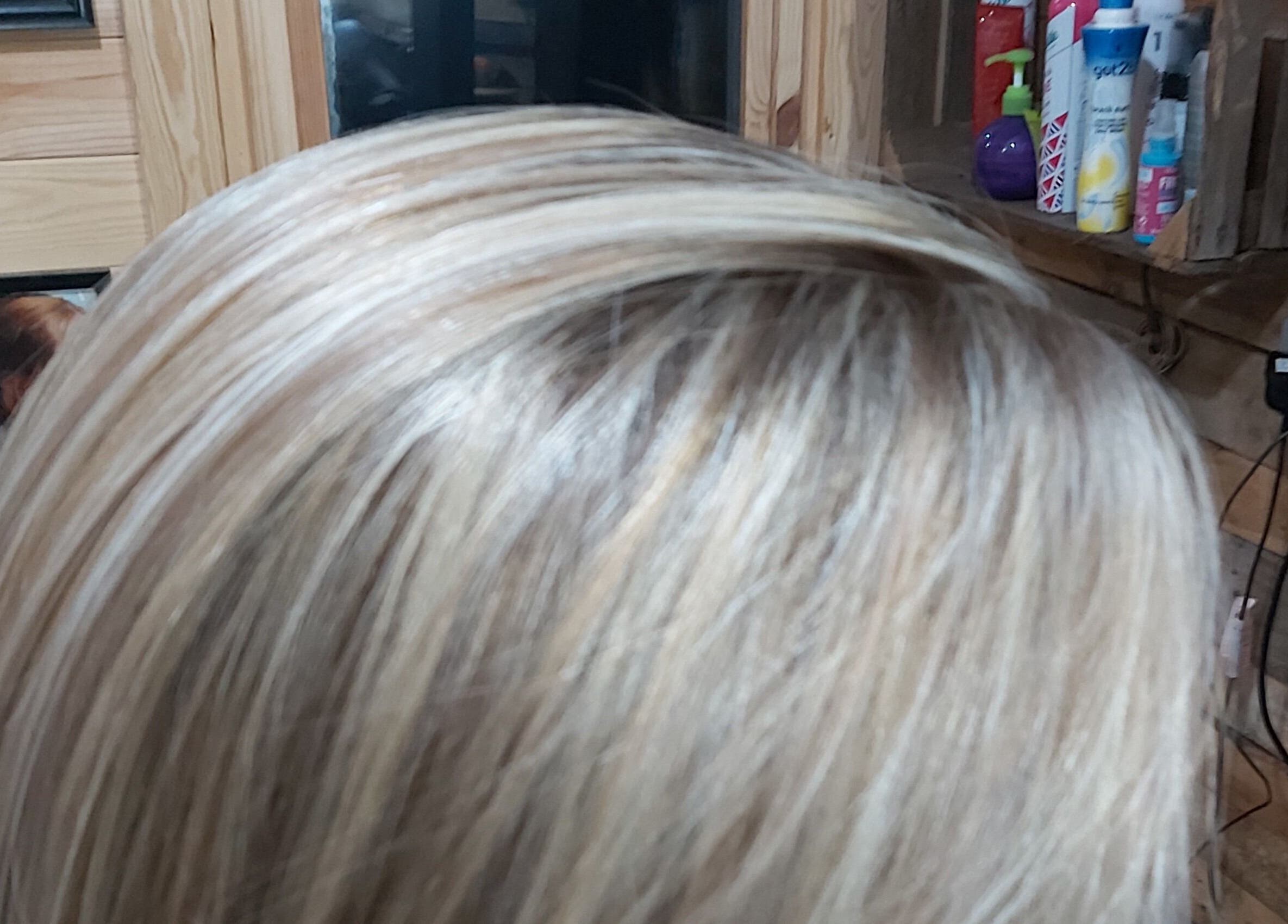 Elegant blonde highlights at The Cabin, Codicote, England, GB, showcasing professional hair styling.