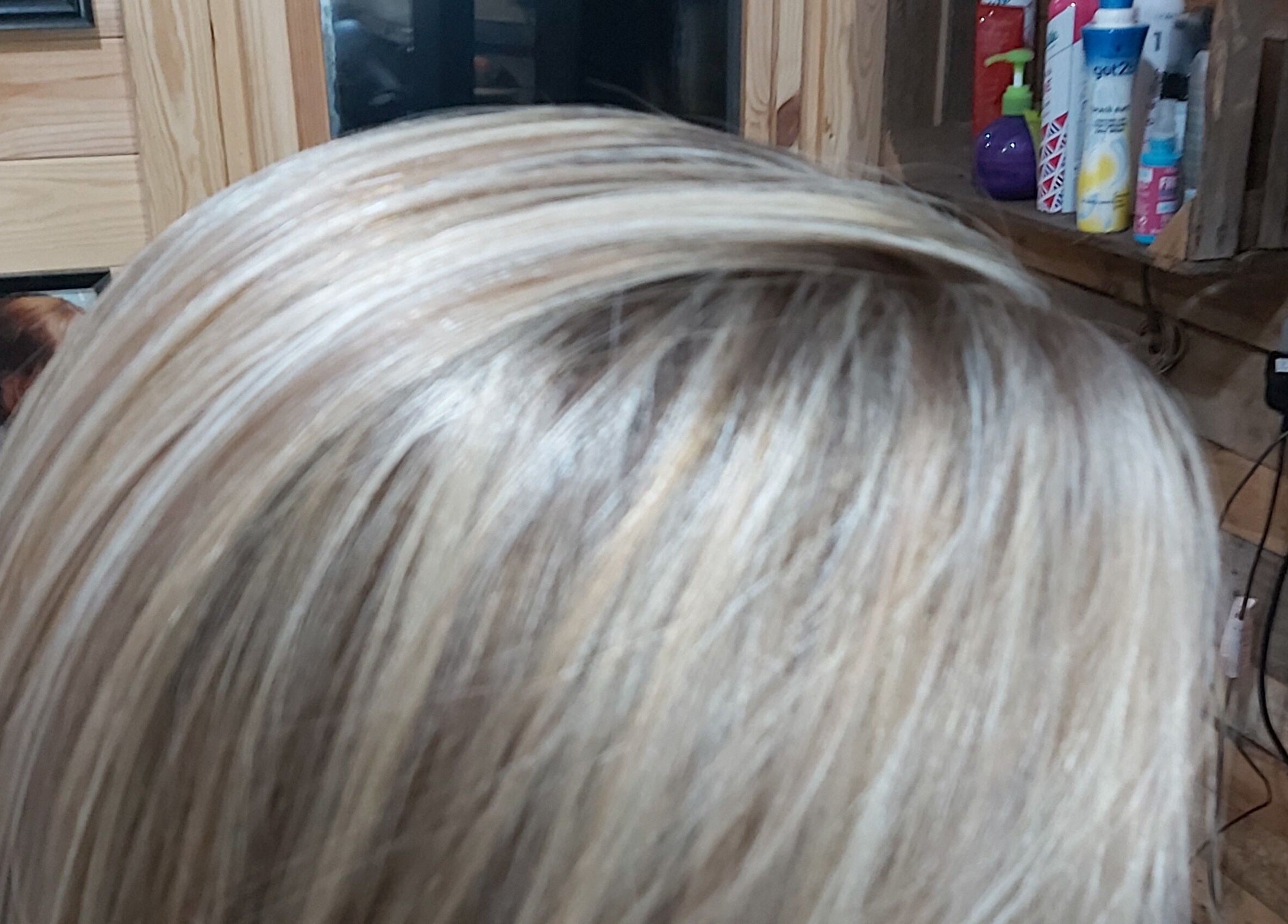 Elegant blonde highlights at The Cabin, Codicote, England, GB, showcasing professional hair styling.