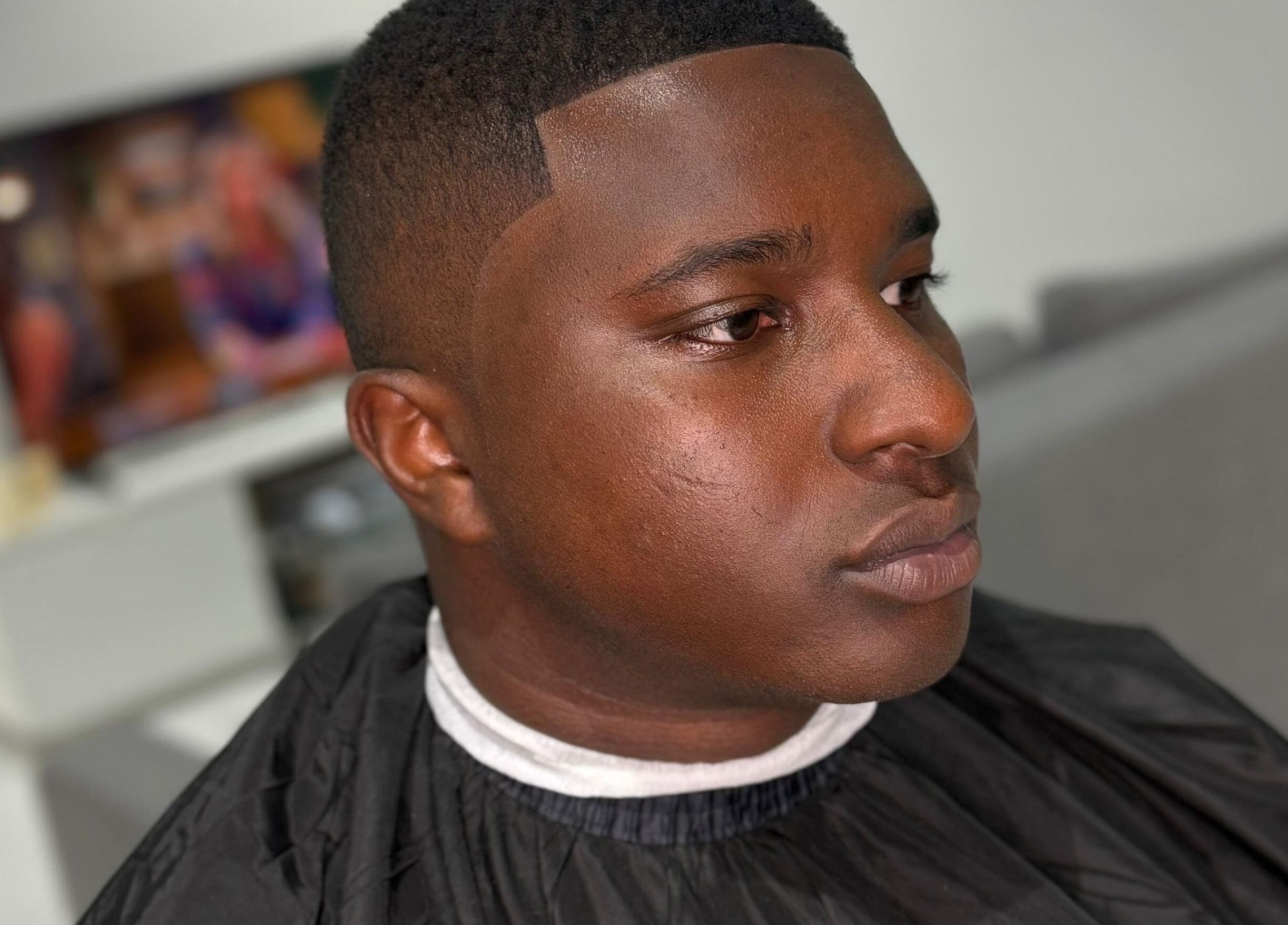 Close-up of a fresh haircut at Klipkonnect, Dubai, Dubai, AE, showcasing precision styling.