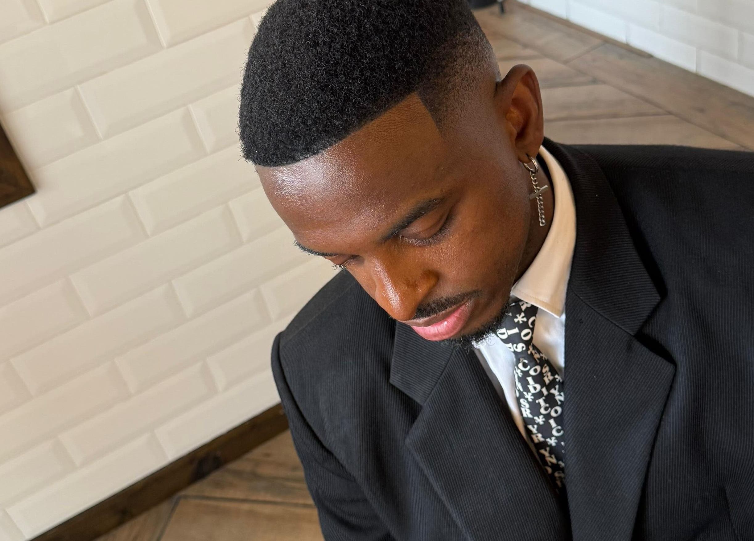 Elegant man with a modern haircut at Klipkonnect, Dubai, Dubai, AE.