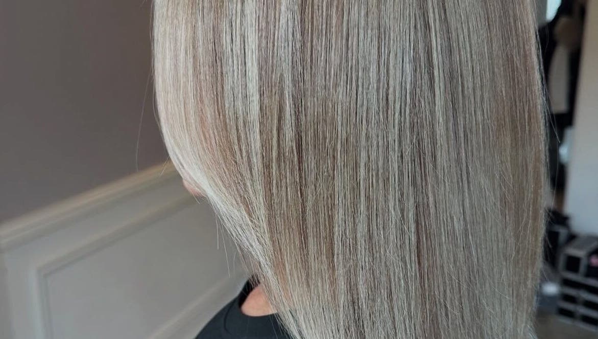 Sleek blonde hairstyle by Mob Hair Mobile Appointments in Giltbrook, England, GB. Perfect for a elegant makeover.