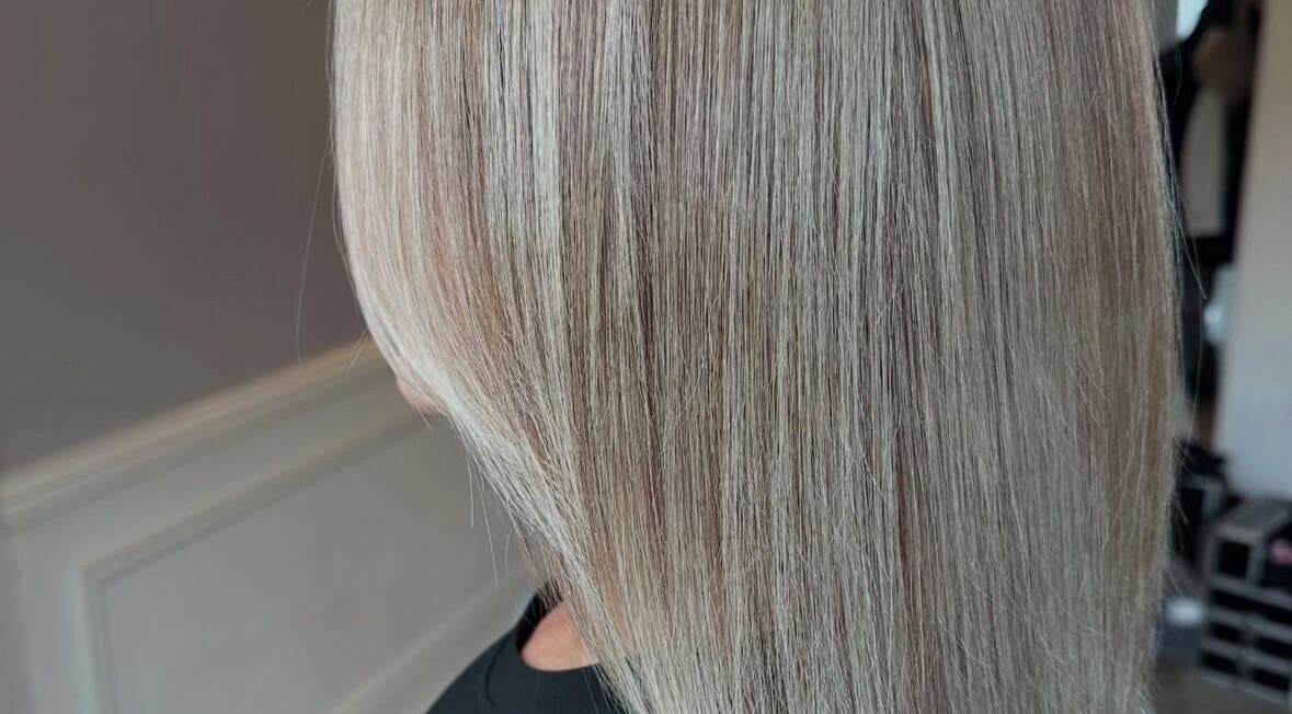 Sleek blonde hairstyle by Mob Hair Mobile Appointments in Giltbrook, England, GB. Perfect for a elegant makeover.