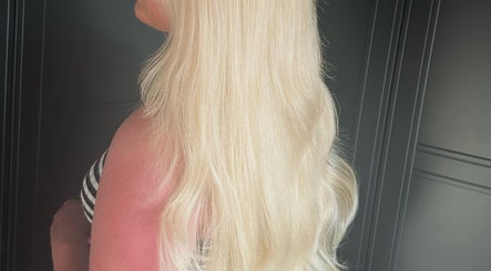 Long, sleek blonde hair captured in Mob Hair Mobile Appointments, Giltbrook, England, GB.