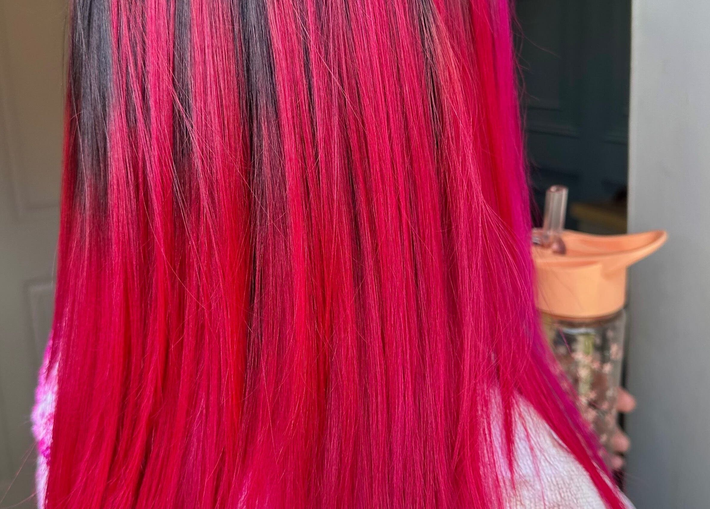 Bright pink balayage by Mob Hair Mobile Appointments in Giltbrook, England, GB. Vibrant and stylish look.