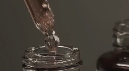 Serum dropper at Delisse Spa - Monsey, Spring Valley, New York, US for a rejuvenating beauty experience.