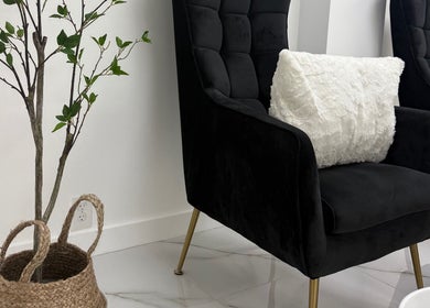Luxurious black chair with white pillow at Delisse Spa - Monsey, Spring Valley, New York, US.