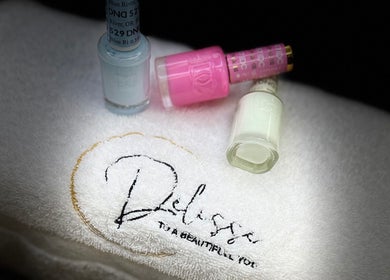Nail polish bottles on Delisse Spa towel at Delisse Spa - Monsey, Spring Valley, New York, US.